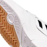 Championes adidas Drop Step Low 2.0 de estilo urbano, color blanco con detalles en negro y gris. Presentan el logo del trébol en el lateral y una suela de goma con diseño de plataforma.