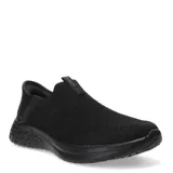 Championes Umbro Flex de hombre, color negro, tipo slip-on, confeccionados en tejido de punto elástico.
