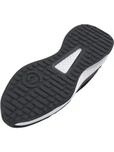 Championes de entrenamiento Under Armour modelo Charged Edge, color negro con detalles en gris y suela blanca. Presentan parte superior de malla transpirable con revestimientos de cuero y material sintético, entresuela Charged Cushioning para amortiguación y suela de goma con tracción.