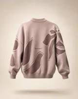 Buzo de punto amplio y relajado, color rosado con diseño floral en tonos marrones. Posee cuello redondo alto y terminaciones acanaladas en cuello, puños y ruedo.