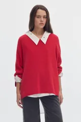 Sweater de punto negro con cuello bote y mangas evasé, confeccionado en algodón con diseño holgado.