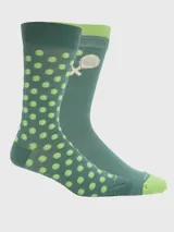 Par de medias de caña media en color verde, con diseño estampado de pelotas de paddle y paletas cruzadas.