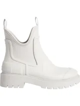 Botas Chelsea impermeables de caña media, color blanco, con paneles elásticos laterales y suela antideslizante.