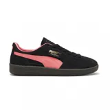 Championes Puma Palermo negros con detalles en blanco y suela color caramelo.