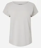 Remera deportiva Get Over de microfibra texturizada color rojo, con mangas cortas, cuello redondo y corte holgado.