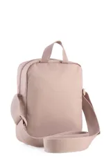 Morral Puma Buzz Portable color rosa viejo con correa ajustable y logo de la marca en relieve en el frente.