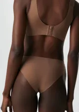 Pack de tres bombachas clásicas de microfibra en color negro, beige y marrón claro.