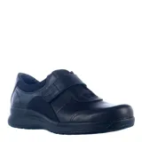 Zapatos casuales de mujer color negro, confeccionados en cuero nobuk, con cierre de velcro y suela de goma antideslizante.