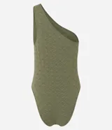 Body de hombro único con diseño sin mangas, confeccionado en tejido texturizado geométrico sin costuras. Cuenta con cierre en la entrepierna.