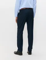 Ambo Harrington Select color azul oscuro, compuesto por saco de botonadura simple, chaleco abotonado y pantalón de vestir a juego, ideal para ocasiones formales.