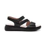 Sandalias negras con plataforma, tiras de cuero con ajuste de velcro y plantilla de cuero.