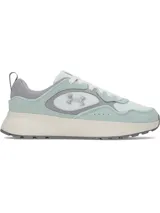 Championes Under Armour modelo W Mirage Sport, con capellada de malla transpirable y superposiciones de gamuza en tono verde menta, detalles en gris y suela con plataforma color beige.