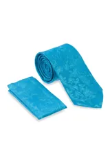 Corbata turquesa con diseño floral y pañuelo de bolsillo a juego.