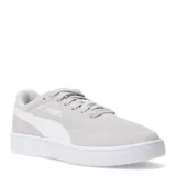 Championes Puma Court Lally SD de gamuza gris con detalles en blanco, cordones planos y suela de goma blanca.