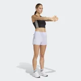 Short deportivo color lila con cintura elástica, cordón ajustable, tecnología AEROREADY, bolsillos laterales con cierre, bolsillo trasero con cierre y detalles reflectivos.