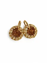 Aros circulares dorados con dije de resina texturizada con brillos, rodeado de strass transparente y argolla de acero quirúrgico.