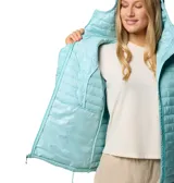 Campera puffer con capucha, color turquesa, con cierre frontal, bolsillos laterales con cierre y puños elásticos. Cuenta con tecnología de aislamiento térmico y tejido resistente a la humedad.