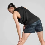 Musculosa deportiva Puma Run Velocity, color amarillo claro, con logo de Puma en el pecho.