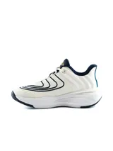 Championes deportivos Umbro para hombre, color gris con detalles en azul y suela blanca y azul.