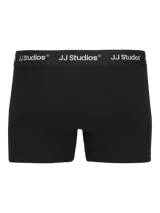 Pack de tres boxers tipo trunk de ajuste ceñido, color negro, con cintura elástica personalizada con el logo de la marca.