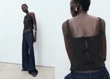 Top negro sin mangas, de corte recto y cuello cuadrado, con tirantes anchos y lazos decorativos en la espalda.