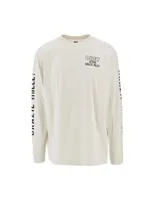 Remera de manga larga Obey, color beige, con cuello redondo y puños acanalados. Presenta estampado gráfico en el pecho y en ambas mangas.