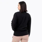 Buzo polar de microfleece con cuello alto y apertura frontal media con botones a presión metálicos. Presenta tapeta y detalles en nylon, con puños y cuello elásticos para mayor ajuste.