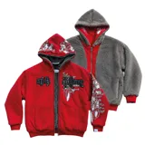 Campera reversible con cierre frontal, confeccionada en algodón de alto gramaje con estampa plastisol y bordado con aplique en un lado, y tela polar de pelo largo en el reverso. Presenta diseño oversize, capucha integrada y puños acanalados.