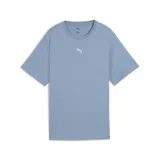 Remera celeste de corte holgado con nudo en la parte inferior y logo de Puma estampado en blanco en el pecho.