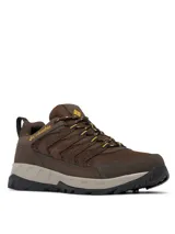 Championes de trekking Columbia modelo Strata Trail Low WP, color marrón con detalles en amarillo y gris, fabricados en malla y gamuza, con suela Omni-Grip y tecnología impermeable Omni-Tech.