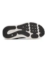 Championes Under Armour Charged Assert 10 para mujer, color negro con entresuela blanca y el logo de la marca en rosado en el lateral. Confeccionados con parte superior de malla transpirable y revestimientos sintéticos.