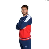 Buzo de fútbol Umbro del Club Nacional de Football, con diseño de bloques de color blanco, azul y rojo. Incluye logo de Umbro y escudo del club.