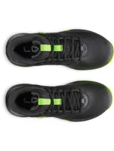 Championes de básquet Under Armour modelo Lockdown 7, color negro con detalles en verde neón en la suela y lengüeta. Presentan una parte superior de malla transpirable con superposiciones de cuero sintético, entresuela de EVA para mayor amortiguación y suela de caucho con patrón de tracción en espiga.