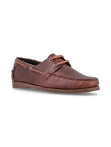 Mocasines tipo náutico Hush Puppies color marrón, confeccionados en cuero con cordones de cuero en contraste y suela de goma.