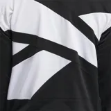 Campera deportiva Reebok Identity para mujer, color negro, con cierre frontal y cuello alto. Presenta ribetes blancos a lo largo de la cremallera y el dobladillo, y un logo Vector grande en la espalda.
