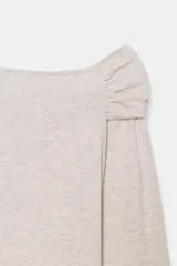 Top de manga larga confeccionado en tejido de algodón, con diseño de escote asimétrico y corte ajustado al cuerpo.