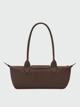 Cartera de hombro pequeña Longchamp Le Pliage Xtra, de diseño estructurado en color marrón oscuro, con asas de hombro y cierre superior.