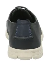 Zapato casual de cuero azul navy de la marca Rockford, modelo Adam. Cuenta con suela de goma blanca, cordones y detalles de costuras visibles.
