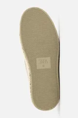 Mocasín casual azul marino de piel serraje con detalle de borlas en el empeine y suela recubierta de yute.