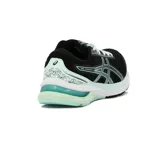 Championes Asics Gel-Shogun 4 para running, color negro con detalles en celeste y blanco, confeccionados con capellada de malla transpirable y suela con tecnología de amortiguación.