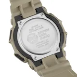 Reloj Casio G-Shock, color beige con detalles en negro y blanco.