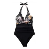 Malla entera de color verde oscuro, combinada con un diseño floreado en la parte inferior. Presenta escote halter cruzado y fruncidos en la zona del abdomen.