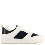 Championes negros de cuero sintético con plataforma blanca.