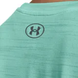 Remera Under Armour Tech para mujer, color coral con textura jaspeada y logo en el pecho.