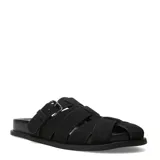 Zuecos de mujer estilo romano color negro, confeccionados con tiras cruzadas en el empeine y una hebilla metálica de ajuste lateral. Presentan suela plana y diseño descubierto en los talones.