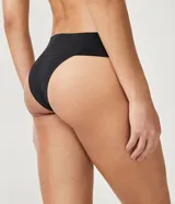 Kit de dos bombachas bikini de microfibra, una color beige y otra color negro, con cintura ancha y logo "Lov" estampado.