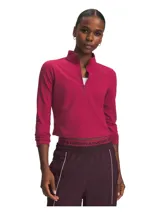 Buzo deportivo Under Armour Motion 1/2 Zip de color fucsia, con cuello alto, cierre frontal parcial y manga larga.