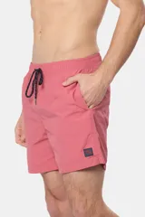 Short de baño negro liso, con cintura elástica y cordón regulable, dos bolsillos laterales y suspensor de malla fina.