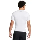 Remera de compresión Under Armour HeatGear de manga corta, diseñada para entrenamiento de alto rendimiento. Presenta un ajuste ceñido al cuerpo, paneles de malla estratégicos para ventilación en axilas y espalda, y mangas raglán híbridas para mayor libertad de movimiento.