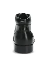 Bota de vestir tipo botineta en cuero negro, con cordones, puntera reforzada y suela de goma con costura decorativa.
